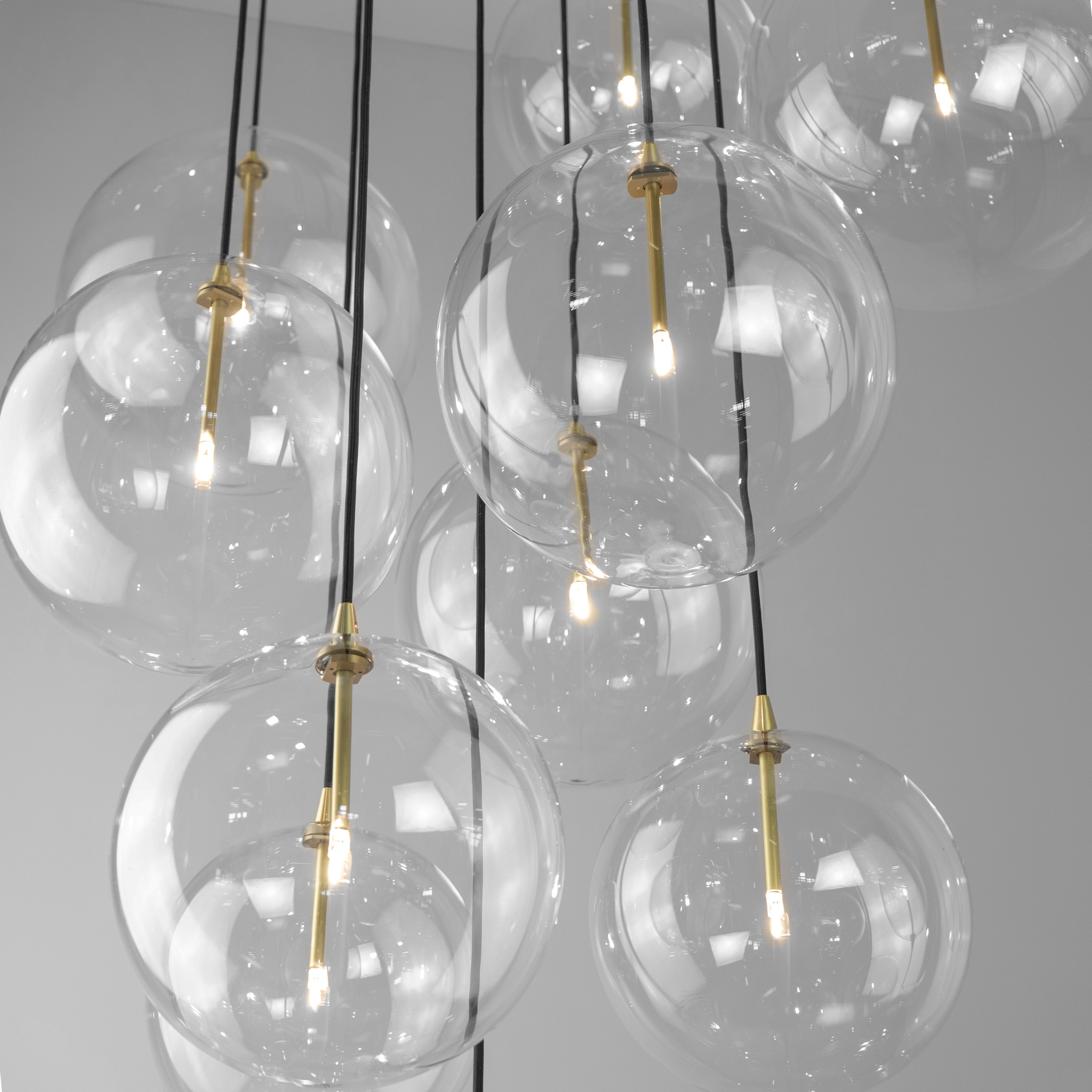 Schwung Cluster 13 Burnished Brass Transparent Globe Mix Chandelier